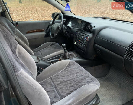 Зелений Опель Омега, об'ємом двигуна 2 л та пробігом 335 тис. км за 1550 $, фото 12 на Automoto.ua