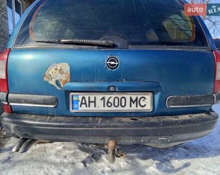 Зеленый Опель Омега, объемом двигателя 2.5 л и пробегом 300 тыс. км за 1006 $, фото 7 на Automoto.ua