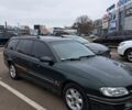 Зелений Опель Омега, об'ємом двигуна 2.5 л та пробігом 200 тис. км за 900 $, фото 1 на Automoto.ua