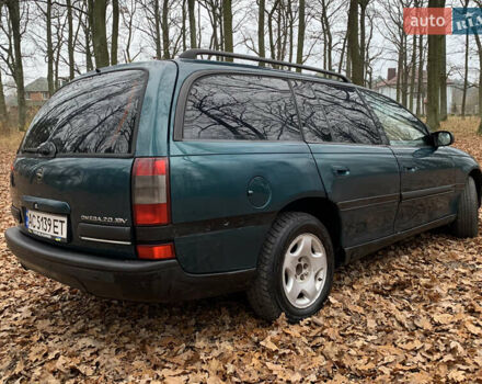 Зелений Опель Омега, об'ємом двигуна 2 л та пробігом 335 тис. км за 1550 $, фото 3 на Automoto.ua