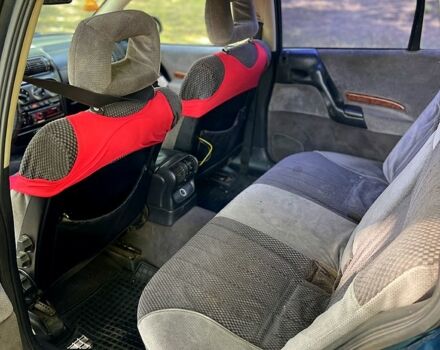 Зеленый Опель Омега, объемом двигателя 2.5 л и пробегом 263 тыс. км за 1400 $, фото 7 на Automoto.ua