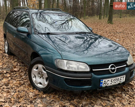 Зелений Опель Омега, об'ємом двигуна 2 л та пробігом 335 тис. км за 1550 $, фото 15 на Automoto.ua