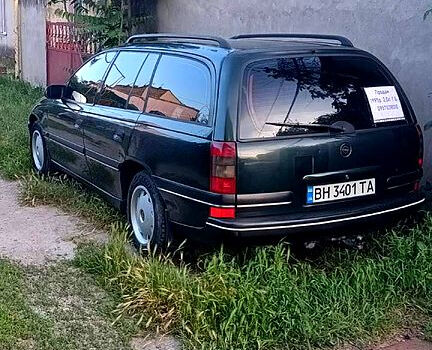 Зеленый Опель Омега, объемом двигателя 2 л и пробегом 500 тыс. км за 3000 $, фото 12 на Automoto.ua