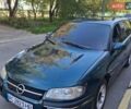 Зеленый Опель Омега, объемом двигателя 2.5 л и пробегом 270 тыс. км за 1000 $, фото 1 на Automoto.ua