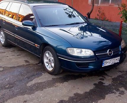 Зеленый Опель Омега, объемом двигателя 2 л и пробегом 380 тыс. км за 3200 $, фото 8 на Automoto.ua
