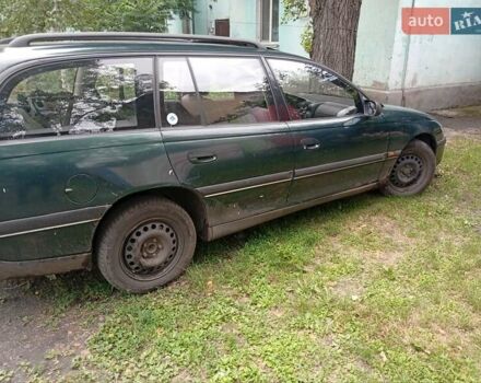 Зеленый Опель Омега, объемом двигателя 2 л и пробегом 200 тыс. км за 1900 $, фото 1 на Automoto.ua