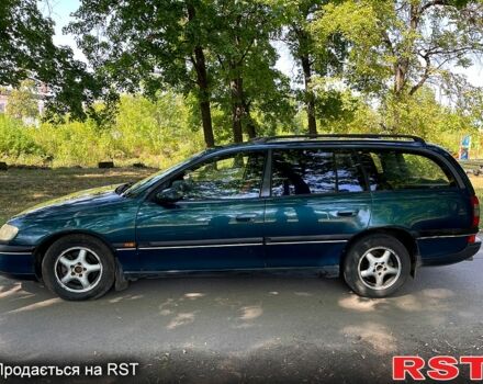 Зеленый Опель Омега, объемом двигателя 2.5 л и пробегом 263 тыс. км за 1400 $, фото 5 на Automoto.ua