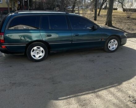 Зеленый Опель Омега, объемом двигателя 2.5 л и пробегом 265 тыс. км за 3000 $, фото 2 на Automoto.ua