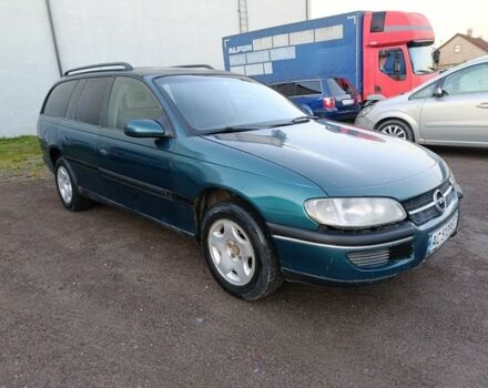 Зеленый Опель Омега, объемом двигателя 2 л и пробегом 327 тыс. км за 1050 $, фото 1 на Automoto.ua