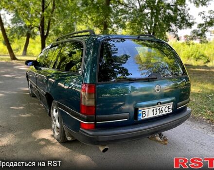 Зеленый Опель Омега, объемом двигателя 2.5 л и пробегом 263 тыс. км за 1400 $, фото 4 на Automoto.ua