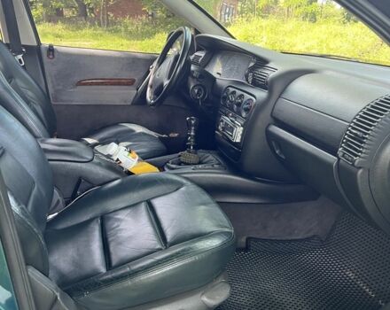 Зеленый Опель Омега, объемом двигателя 2.5 л и пробегом 290 тыс. км за 3200 $, фото 8 на Automoto.ua