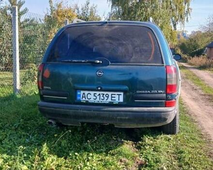 Зелений Опель Омега, об'ємом двигуна 2 л та пробігом 350 тис. км за 750 $, фото 6 на Automoto.ua
