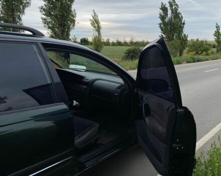 Зелений Опель Омега, об'ємом двигуна 2 л та пробігом 380 тис. км за 2214 $, фото 2 на Automoto.ua