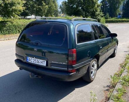 Зеленый Опель Омега, объемом двигателя 2 л и пробегом 300 тыс. км за 2350 $, фото 1 на Automoto.ua