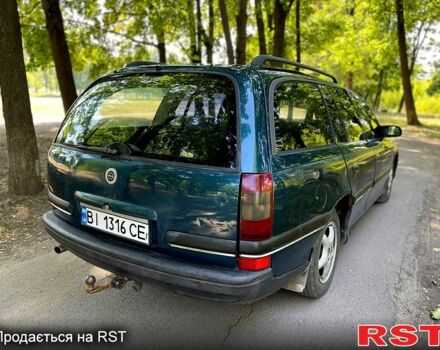 Зеленый Опель Омега, объемом двигателя 2.5 л и пробегом 263 тыс. км за 1400 $, фото 3 на Automoto.ua