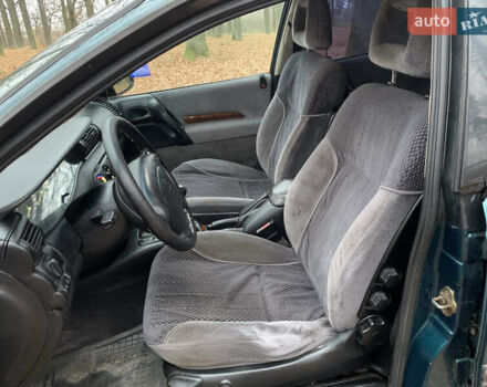 Зелений Опель Омега, об'ємом двигуна 2 л та пробігом 335 тис. км за 1550 $, фото 7 на Automoto.ua