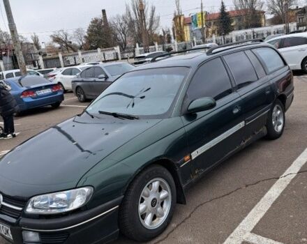 Зелений Опель Омега, об'ємом двигуна 2.5 л та пробігом 200 тис. км за 900 $, фото 2 на Automoto.ua