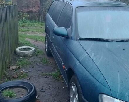 Зеленый Опель Омега, объемом двигателя 2 л и пробегом 317 тыс. км за 2000 $, фото 1 на Automoto.ua