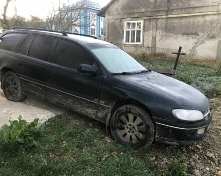 Зелений Опель Омега, об'ємом двигуна 2 л та пробігом 275 тис. км за 1200 $, фото 2 на Automoto.ua