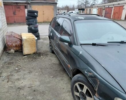 Зеленый Опель Омега, объемом двигателя 2 л и пробегом 300 тыс. км за 350 $, фото 2 на Automoto.ua