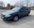 Зеленый Опель Омега, объемом двигателя 2 л и пробегом 290 тыс. км за 2900 $, фото 1 на Automoto.ua