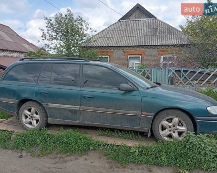 Зеленый Опель Омега, объемом двигателя 2 л и пробегом 330 тыс. км за 2400 $, фото 5 на Automoto.ua