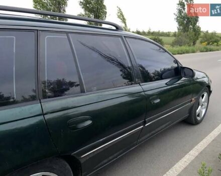 Зелений Опель Омега, об'ємом двигуна 2 л та пробігом 380 тис. км за 2210 $, фото 2 на Automoto.ua