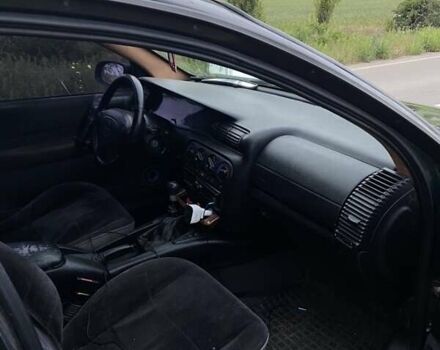 Зелений Опель Омега, об'ємом двигуна 2 л та пробігом 380 тис. км за 2210 $, фото 1 на Automoto.ua