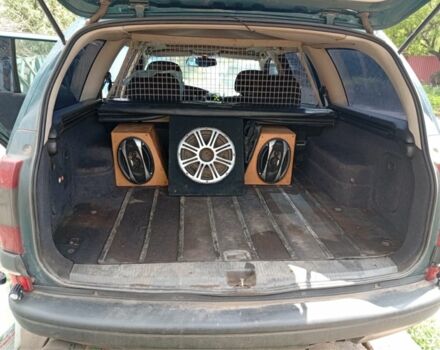 Зеленый Опель Омега, объемом двигателя 2 л и пробегом 300 тыс. км за 2400 $, фото 4 на Automoto.ua