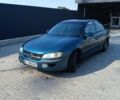 Зеленый Опель Омега, объемом двигателя 2 л и пробегом 241 тыс. км за 1850 $, фото 1 на Automoto.ua