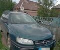 Зеленый Опель Омега, объемом двигателя 2 л и пробегом 330 тыс. км за 2400 $, фото 1 на Automoto.ua