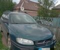 Зеленый Опель Омега, объемом двигателя 2 л и пробегом 330 тыс. км за 2400 $, фото 2 на Automoto.ua