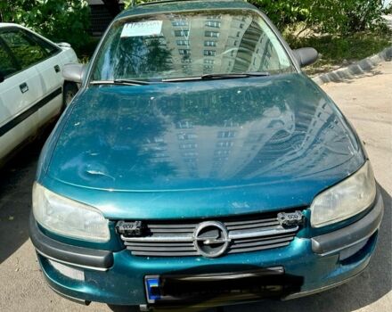 Зеленый Опель Омега, объемом двигателя 2 л и пробегом 300 тыс. км за 2400 $, фото 1 на Automoto.ua