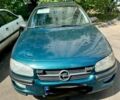 Зеленый Опель Омега, объемом двигателя 2 л и пробегом 300 тыс. км за 2400 $, фото 1 на Automoto.ua