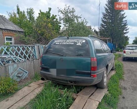 Зеленый Опель Омега, объемом двигателя 2 л и пробегом 330 тыс. км за 2400 $, фото 7 на Automoto.ua
