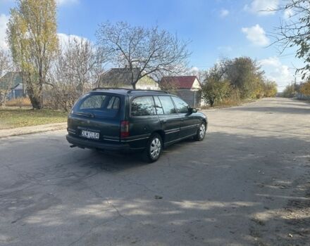 Зелений Опель Омега, об'ємом двигуна 2 л та пробігом 295 тис. км за 1300 $, фото 5 на Automoto.ua