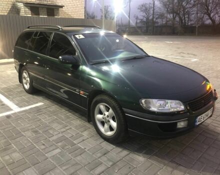 Зеленый Опель Омега, объемом двигателя 2.5 л и пробегом 2 тыс. км за 4100 $, фото 4 на Automoto.ua