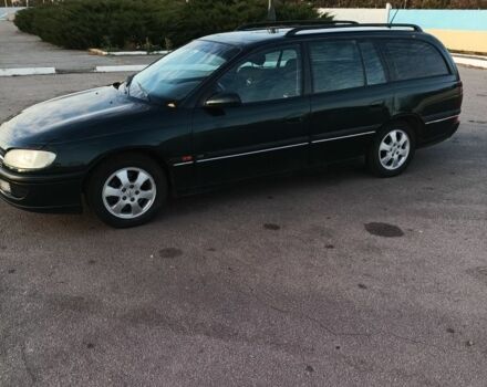 Зеленый Опель Омега, объемом двигателя 2 л и пробегом 352 тыс. км за 2200 $, фото 1 на Automoto.ua