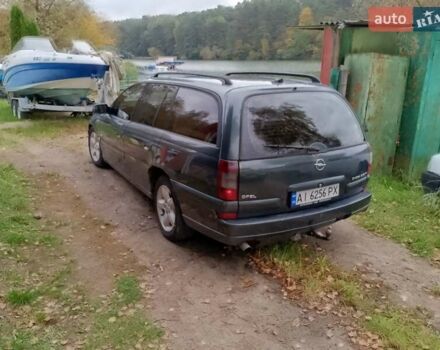 Зеленый Опель Омега, объемом двигателя 2.5 л и пробегом 217 тыс. км за 2900 $, фото 2 на Automoto.ua