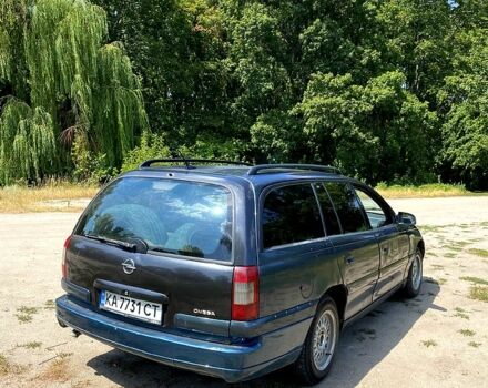 Зелений Опель Омега, об'ємом двигуна 2.5 л та пробігом 239 тис. км за 2100 $, фото 4 на Automoto.ua