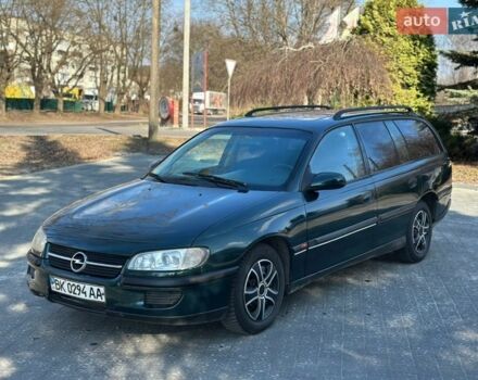 Зеленый Опель Омега, объемом двигателя 2 л и пробегом 200 тыс. км за 1650 $, фото 1 на Automoto.ua