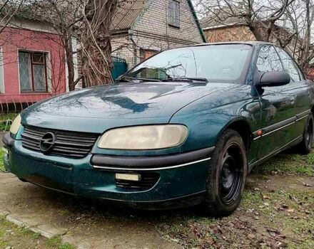 Зеленый Опель Омега, объемом двигателя 2 л и пробегом 300 тыс. км за 2700 $, фото 1 на Automoto.ua