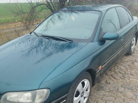 Зеленый Опель Омега, объемом двигателя 2.5 л и пробегом 450 тыс. км за 1904 $, фото 1 на Automoto.ua