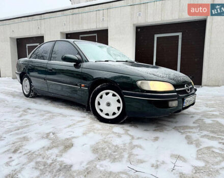 Зеленый Опель Омега, объемом двигателя 2 л и пробегом 300 тыс. км за 1500 $, фото 1 на Automoto.ua