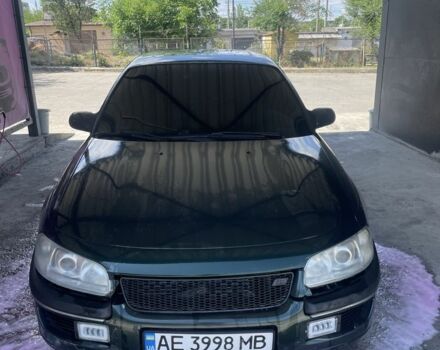 Зеленый Опель Омега, объемом двигателя 2 л и пробегом 430 тыс. км за 2350 $, фото 1 на Automoto.ua