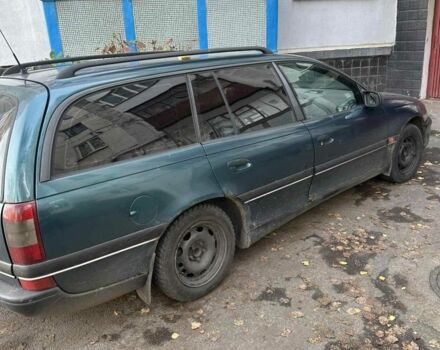 Зелений Опель Омега, об'ємом двигуна 2 л та пробігом 157 тис. км за 1301 $, фото 1 на Automoto.ua