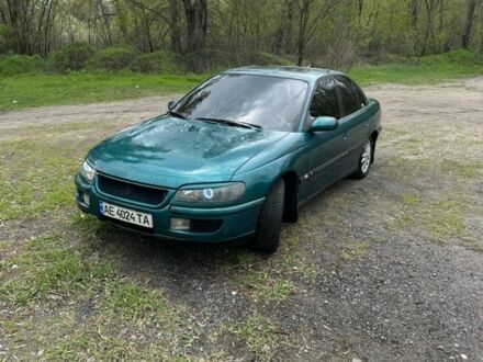 Зеленый Опель Омега, объемом двигателя 2.5 л и пробегом 460 тыс. км за 2500 $, фото 1 на Automoto.ua