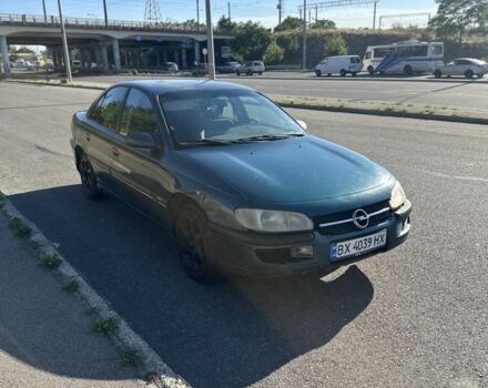 Зеленый Опель Омега, объемом двигателя 2 л и пробегом 200 тыс. км за 850 $, фото 1 на Automoto.ua