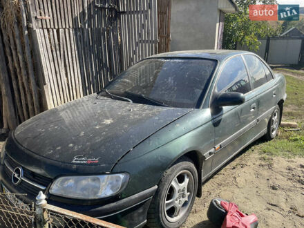 Зелений Опель Омега, об'ємом двигуна 2 л та пробігом 306 тис. км за 1500 $, фото 1 на Automoto.ua
