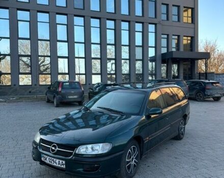 Зеленый Опель Омега, объемом двигателя 2 л и пробегом 250 тыс. км за 1750 $, фото 1 на Automoto.ua